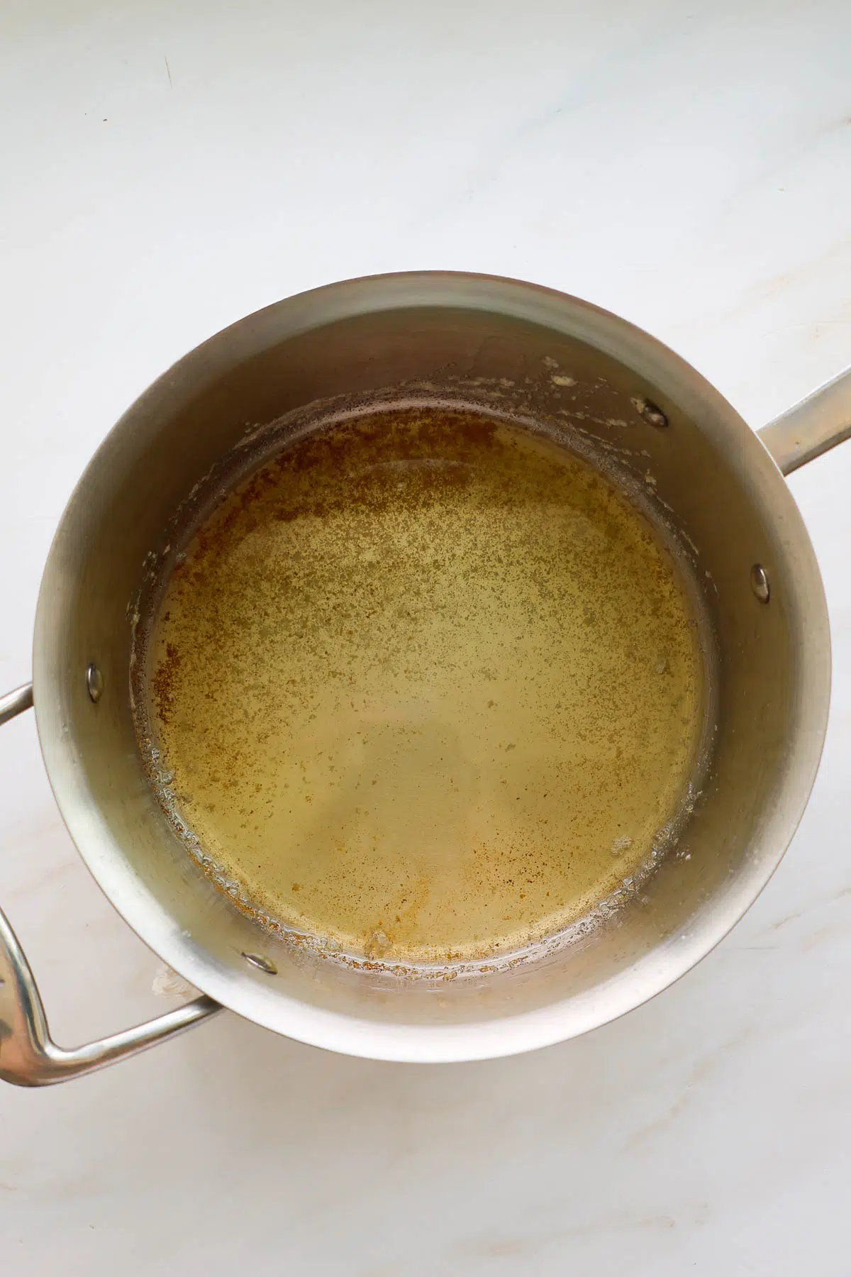 Browned butter in a saucepan.