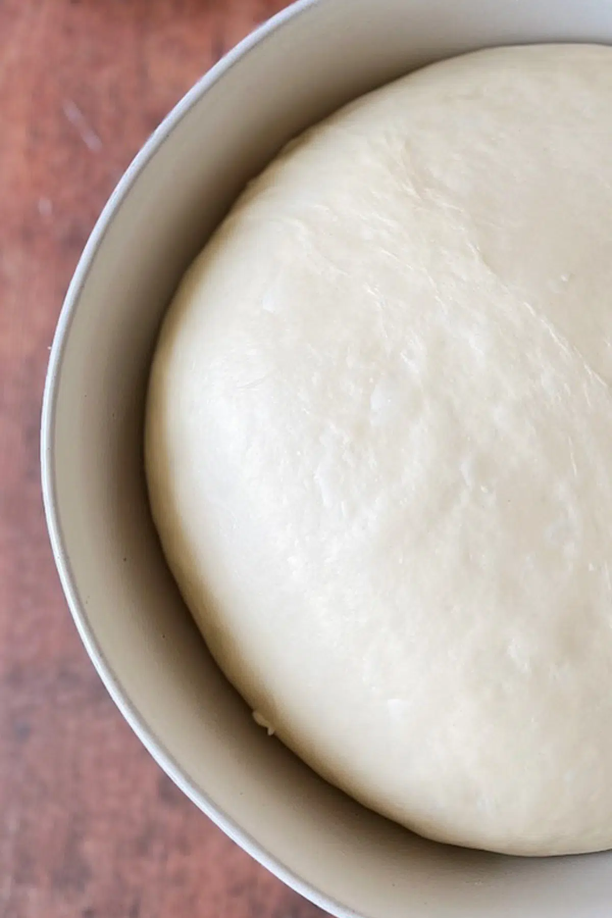 A bowl of dough rising.