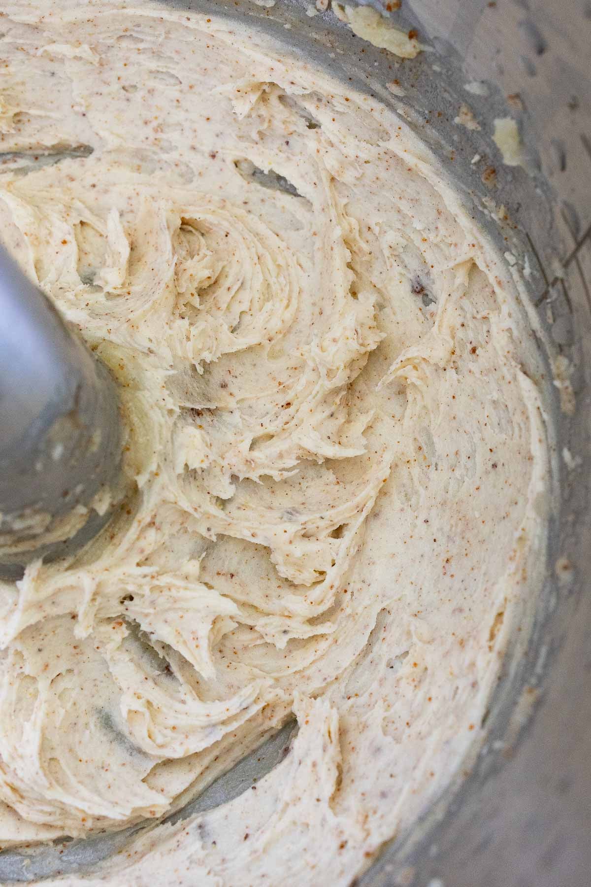 Browned butter, in a creamy texture, in the bottom of a mixer bowl.